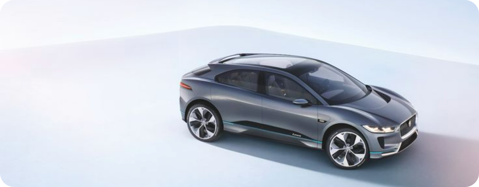 a jaguar i pace is sitting on a white surface